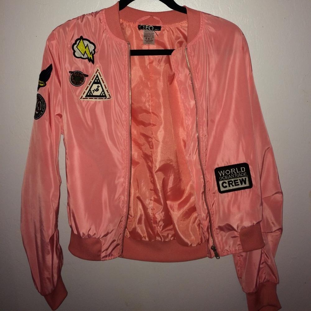 Pink bomber jacket with emblems